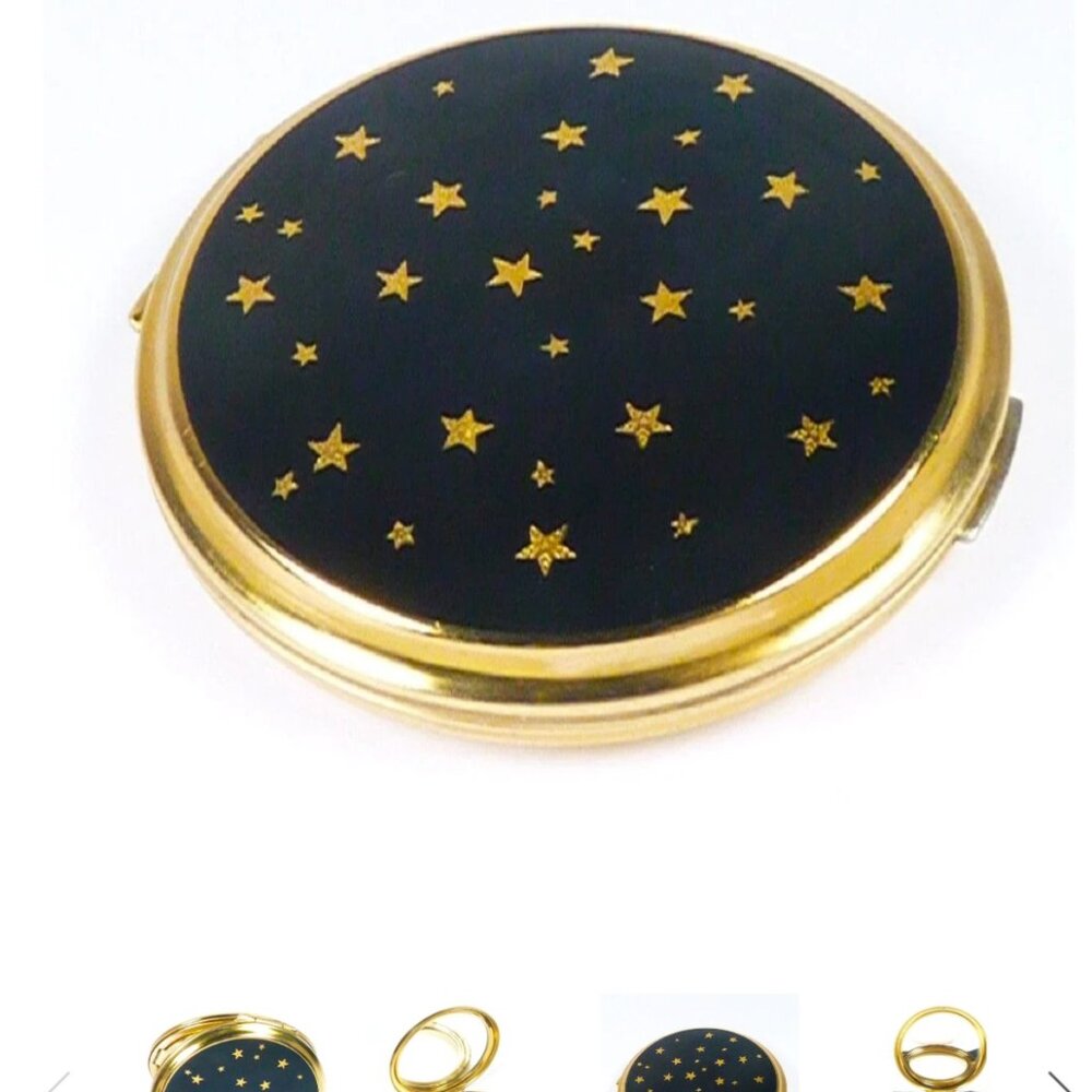 In search of Stratton compact- black with gold stars